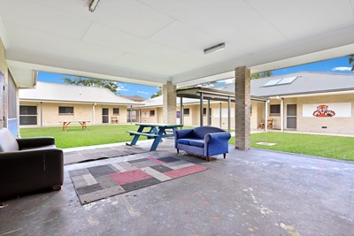 Communal covered outdoor courtyard in Lifestyle Solutions Supported Independent Living property with five self-contained villas in Quakers Hill, Sydney