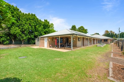 Back of house showing undercover gym and garden at Lifestyle Solutions Supported Independent Living property in Wyong, NSW