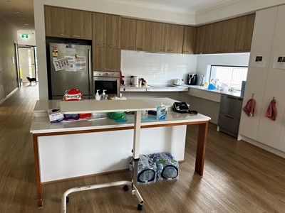 Fully accessible kitchen in Lifestyle Solutions three-bedroom Specialist Disability Accommodation (SDA) in Pallara, Qld